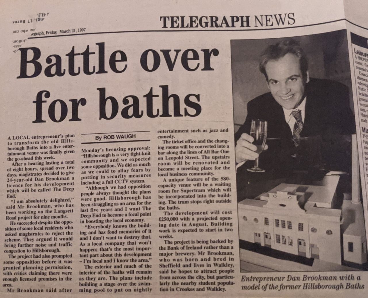 Sheffield Telegraph front page from 21 March 1997, headlined &lsquo;Battle over for baths&rsquo;, with Dan Brookman pictured holding a scale model of the Hillsborough Baths.